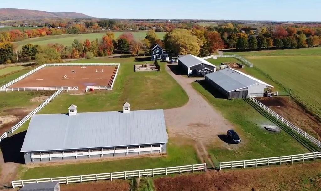 Drone view of barns, fenced arenas, out buildings on Willow and Withers Stables