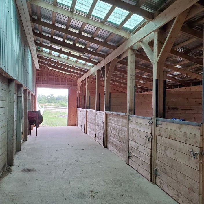 Aisle way in Lesson Barn, Willow and Withers Stables