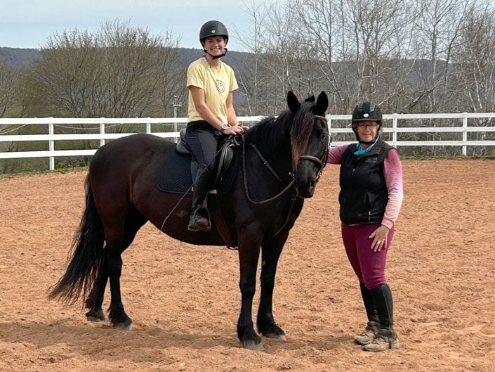 Laura Kelland May with an equestrian student