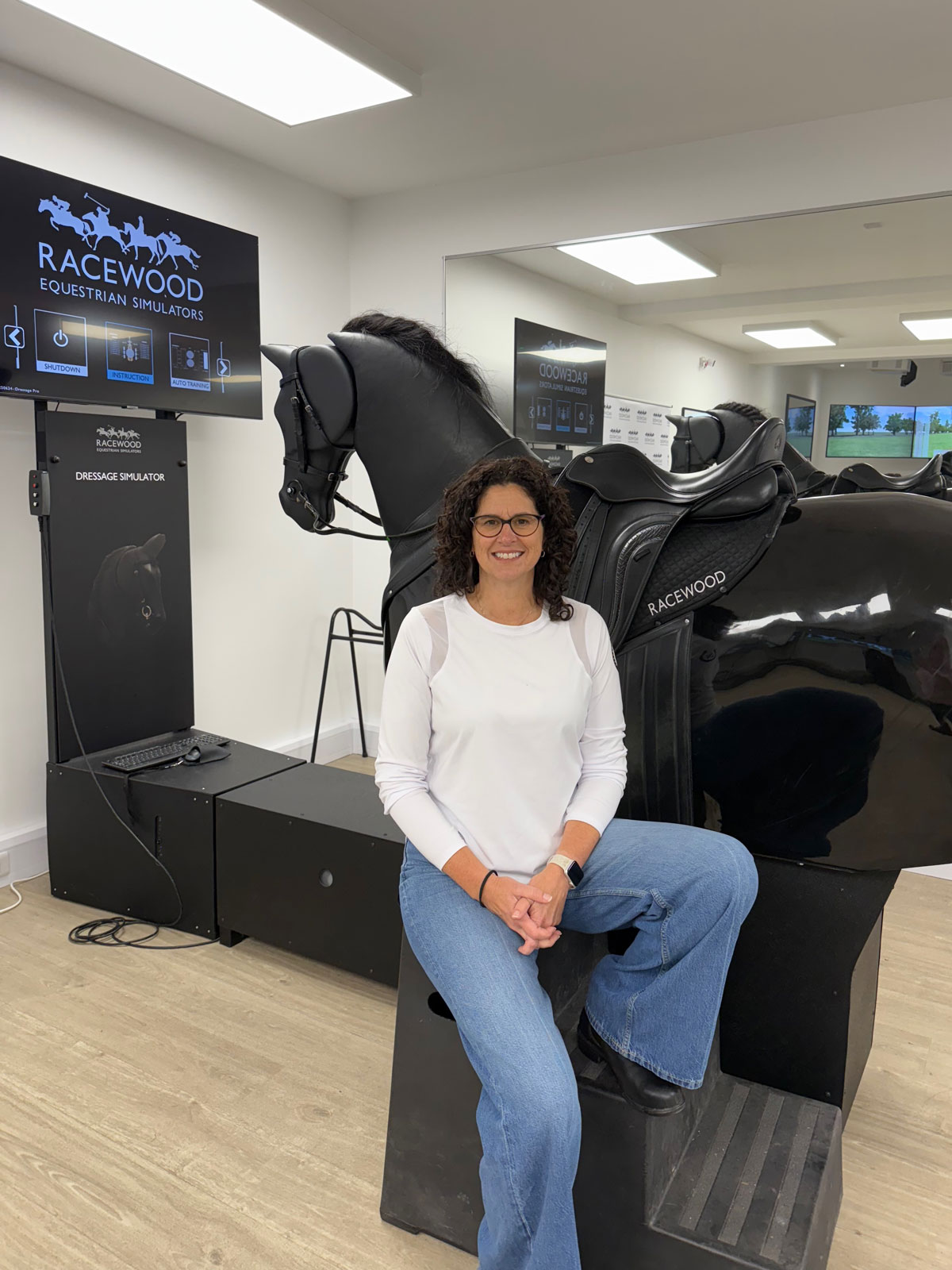 Melanie Taljaard with Racewood Horse Simulator