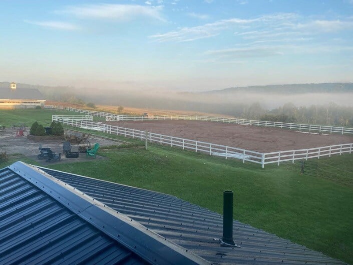 View of outdoor riding ring at Willow and Withers Stables